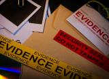 Police evidence files, and tape labelled "evidence"